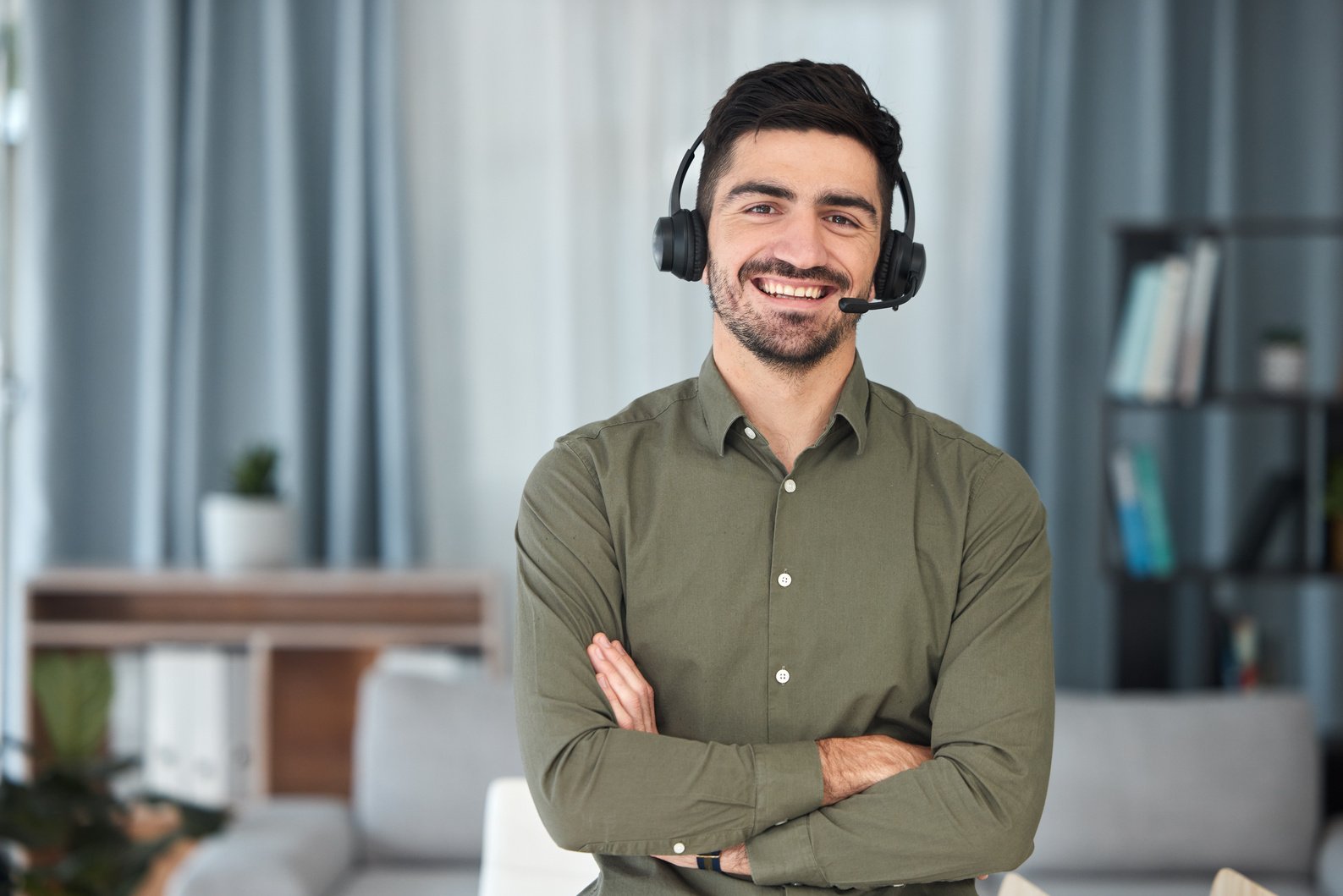 Man, Portrait and Microphone for Working in Home Office for Virtual Assistant, Voip Communication and Advisory Telemarketing. Happy Sales Agent, Remote Worker and Arms Crossed for Telecom Consulting